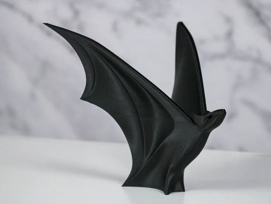 Dynamic Minimalist Flying Bat Statue