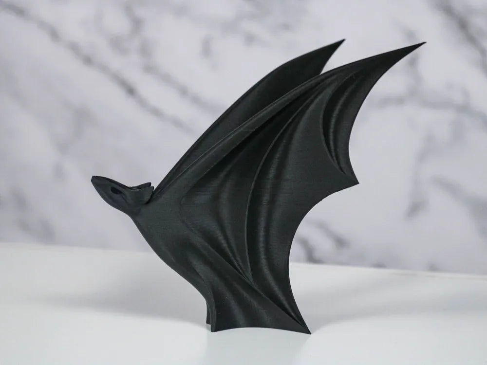 Dynamic Minimalist Flying Bat Statue